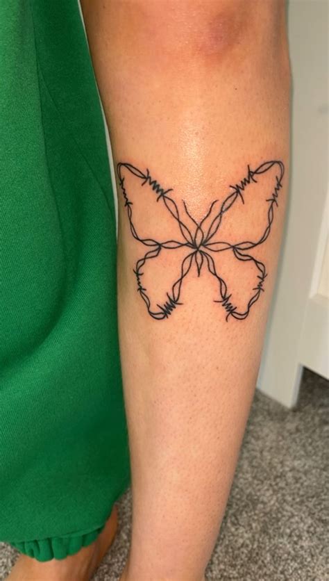 barbwire tattoo designs|barbed wire butterfly tattoo.